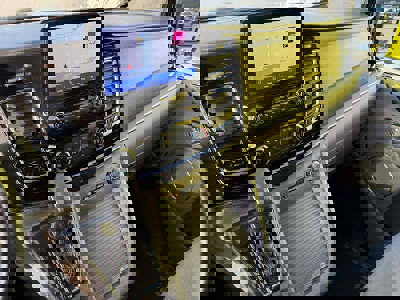 Image Ford TRANSIT/TOURNEO CUSTOM COMBI 320 1.0 125 L1 Tourneo Hybrid Titanium GPS Caméra Carplay 8 places Régul Clim auto Gtie 1 an